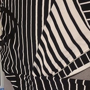 A sweater with a lot details